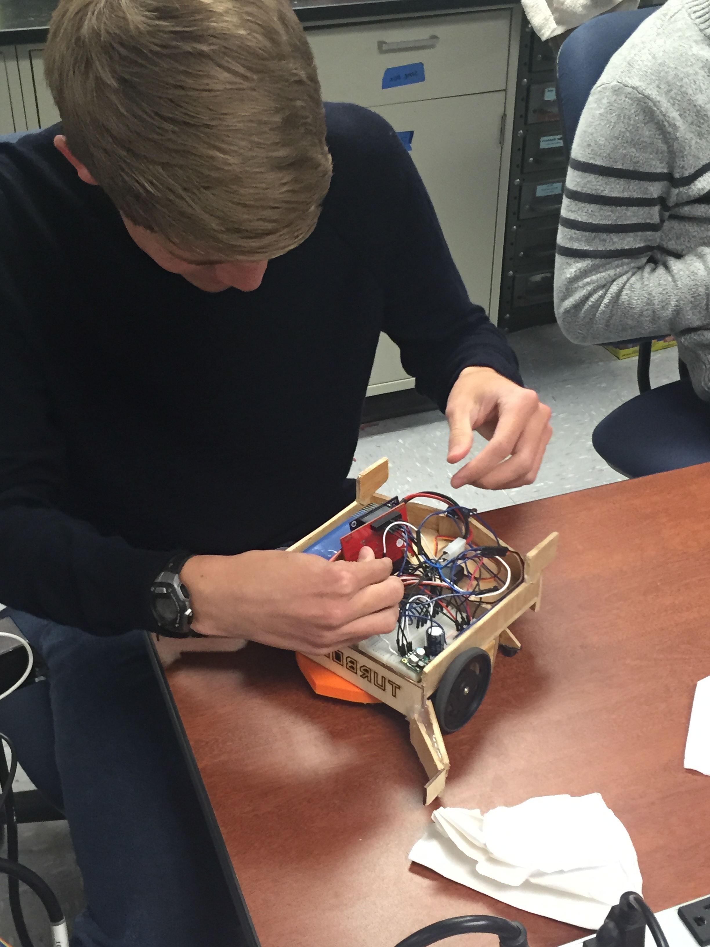 Turbolifts member Mark working on Robot